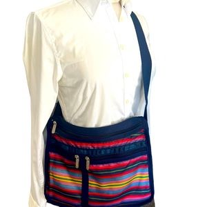 Lesportsac crossbody expandable zip closure multi pocket shoulder bag in medium